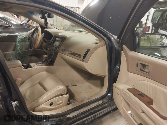2005 Cadillac STS with VIN 1G6DC67AX50201697, listed as a IAAI auction lot 41822466 with 122,089 mi miles. Bid and sale history available at carsss.com. Image 5.