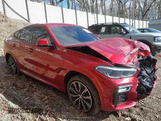 2021 BMW X6 xDrive40i with VIN 5UXCY6C01M9F72797, listed as a IAAI auction lot 41810317 with 16,084 mi miles. Bid and sale history available at carsss.com. Image 1.