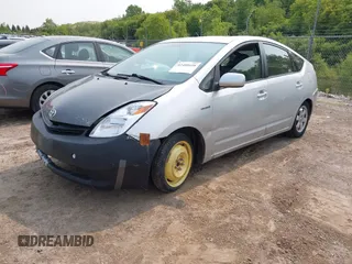 2007 Toyota Prius z VIN JTDKB20U677694177, wystawiony jako IAAI lot #42408658 z przebiegiem 261 175 mil mil oraz . Historia ofert i sprzedaży dostępna na DreamBid. Obrazek 2.