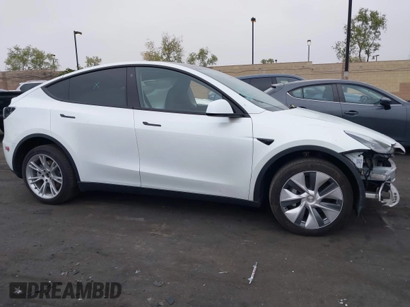 2023 Tesla Model Y Long Range z VIN 7SAYGDEE5PA063097, wystawiony jako IAAI lot #42171871 z przebiegiem Nie podano mil oraz . Historia ofert i sprzedaży dostępna na DreamBid. Obrazek 14.