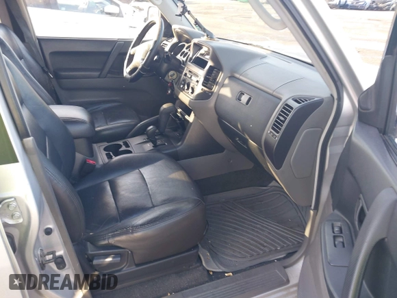 2003 Mitsubishi Montero z VIN JA4NW31S93J037224, wystawiony jako IAAI lot #41848661 z przebiegiem 206 151 mil mil oraz . Historia ofert i sprzedaży dostępna na DreamBid. Obrazek 5.
