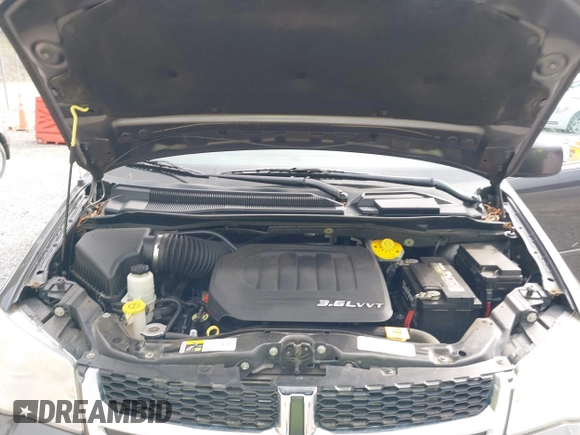 2014 Dodge Grand Caravan SXT with VIN 2C4RDGCG6ER376714, listed as a IAAI auction lot 41828025 with 172,285 mi miles and . Bid and sale history available at DreamBid. Image 10.