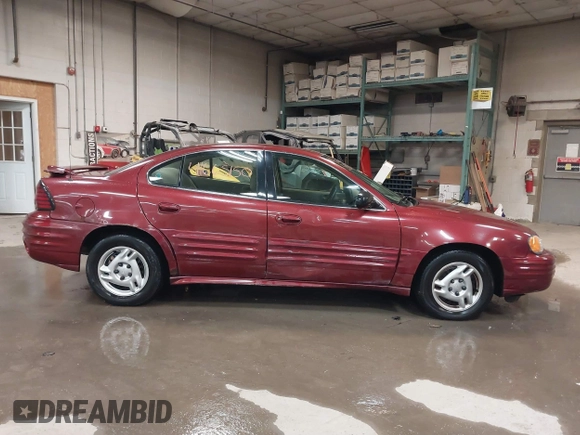 2002 Pontiac Grand Am SE z VIN 1G2NE52F92C291335, wystawiony jako IAAI lot #41665150 z przebiegiem 75 552 mil mil oraz . Historia ofert i sprzedaży dostępna na DreamBid. Obrazek 14.