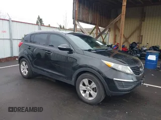 2011 Kia Sportage LX with VIN KNDPB3A26B7100916, listed as a IAAI auction lot 41939760 with 205,890 mi miles and . Bid and sale history available at carsss.com. Image 1.