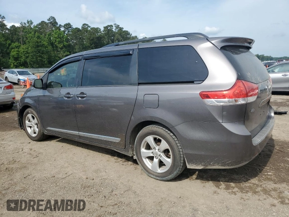 2014 Toyota Sienna LE AAS with VIN 5TDKK3DCXES491979, listed as a Copart auction lot 58493005 with 165,975 mi miles and Salvage title. Bid and sale history available at DreamBid. Image 2.