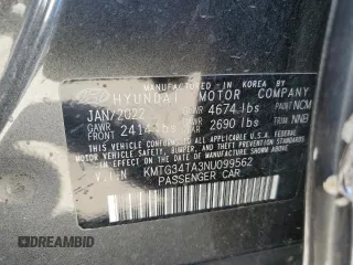 2022 Genesis G70 2.0T with VIN KMTG34TA3NU099562, listed as a Copart auction lot 69646954 with 50,334 mi miles and Salvage Title. Bid and sale history available at carsss.com. Image 12.