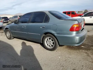 2000 Honda Civic VP with VIN 2HGEJ6617YH545899, listed as a Copart auction lot 86648614 with 212,551 mi miles and Salvage Title. Bid and sale history available at carsss.com. Image 2.