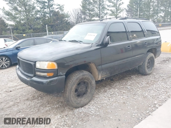 2003 GMC Yukon SLT with VIN 1GKEC13ZX3R181111, listed as a IAAI auction lot 41496338 with 307,996 mi miles. Bid and sale history available at carsss.com. Image 2.