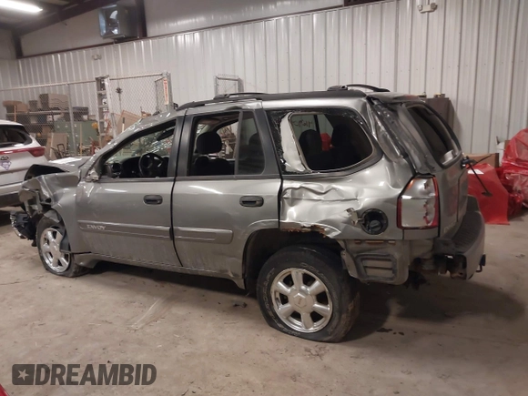 2005 GMC Envoy SLT with VIN 1GKDT13S352257892, listed as a IAAI auction lot 41690880 with 134,216 mi miles. Bid and sale history available at carsss.com. Image 14.