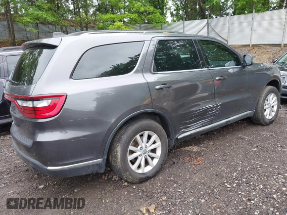 2015 Dodge Durango SXT with VIN 1C4RDJAG6FC177561, listed as a IAAI auction lot 42314437 with 104,898 mi miles and . Bid and sale history available at DreamBid. Image 4.