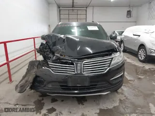 2015 Lincoln MKC with VIN 5LMCJ2A96FUJ47288, listed as a IAAI auction lot 41566290 with 102,316 mi miles. Bid and sale history available at carsss.com. Image 12.