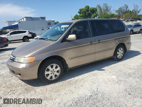 2004 Honda Odyssey EX-RES z VIN 5FNRL18814B125773, wystawiony jako Copart lot #58205565 z przebiegiem 250 732 mil mil oraz Szkoda całkowita • Salvage title. Historia ofert i sprzedaży dostępna na DreamBid. Obrazek 1.