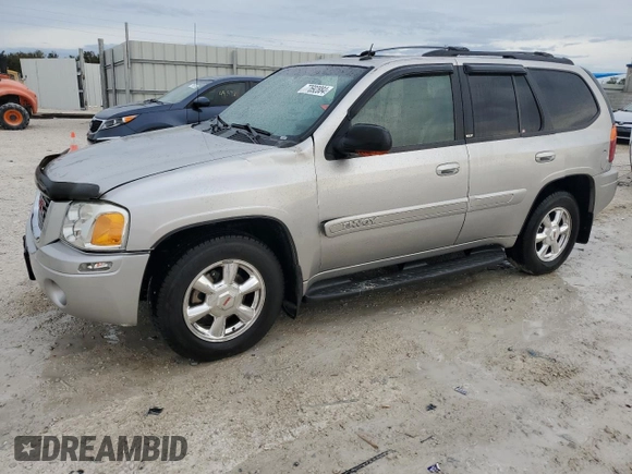 2004 GMC Envoy SLT with VIN 1GKDT13S742106035, listed as a Copart auction lot 77692884 with 122,188 mi miles and Non Repairable. Bid and sale history available at DreamBid. Image 1.