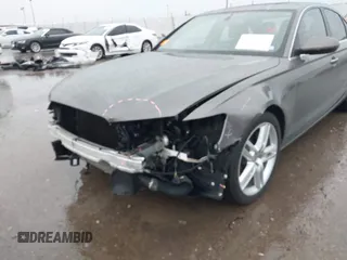 2014 Audi A6 Premium Plus z VIN WAUGFAFC3EN087176, wystawiony jako IAAI lot #42117602 z przebiegiem 53 571 mil mil oraz . Historia ofert i sprzedaży dostępna na DreamBid. Obrazek 6.