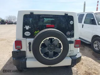 2012 Jeep Wrangler Unlimited Sahara with VIN 1C4HJWEG3CL254944, listed as a IAAI auction lot 42060981 with 172,358 mi miles. Bid and sale history available at carsss.com. Image 16.