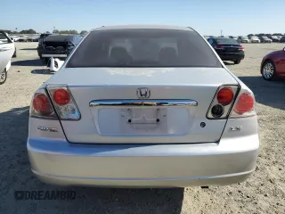 2001 Honda Civic LX z VIN 2HGES16521H511166, wystawiony jako Copart lot #61850595 z przebiegiem 153 192 mil mil oraz Szkoda całkowita • Salvage title. Historia ofert i sprzedaży dostępna na DreamBid. Obrazek 6.