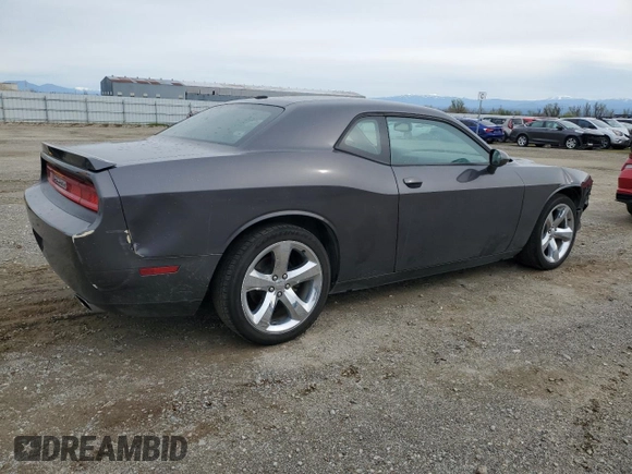 2013 Dodge Challenger R/T z VIN 2C3CDYBT0DH741262, wystawiony jako Copart lot #49185255 z przebiegiem 97 902 mil mil oraz Szkoda całkowita • Salvage title. Historia ofert i sprzedaży dostępna na DreamBid. Obrazek 3.