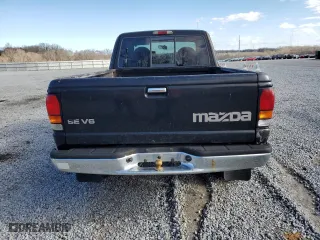 1999 Mazda B-Series 4WD Truck SE with VIN 4F4ZR17V9XTM08565, listed as a Copart auction lot 49249005 with 180,943 mi miles and Salvage Title. Bid and sale history available at carsss.com. Image 6.