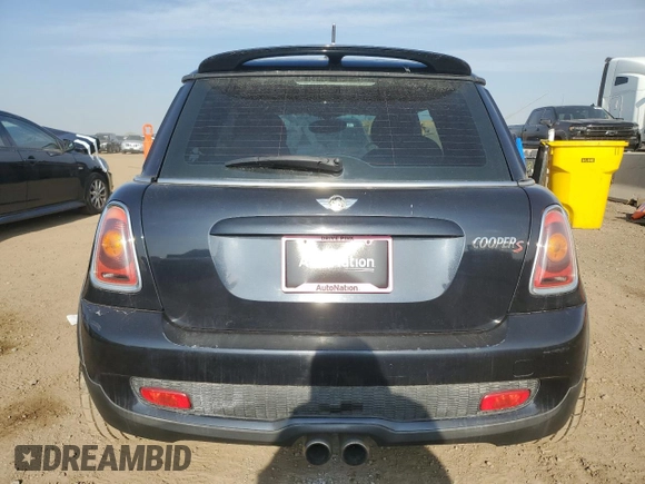 2009 MINI Hardtop S with VIN WMWMF73599TT94509, listed as a Copart auction lot 53495645 with Not provided miles and Salvage title. Bid and sale history available at DreamBid. Image 6.