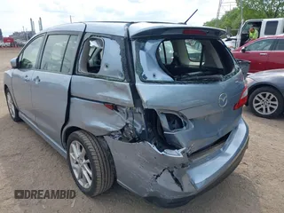 2012 Mazda 5 Grand Touring z VIN JM1CW2DL2C0127851, wystawiony jako IAAI lot #42217090 z przebiegiem 123 900 mil mil oraz . Historia ofert i sprzedaży dostępna na DreamBid. Obrazek 6.