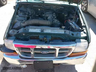 1999 Ford Ranger XLT with VIN 1FTZR15X0XPA00817, listed as a IAAI auction lot 41855947 with 215,786 mi miles. Bid and sale history available at carsss.com. Image 10.