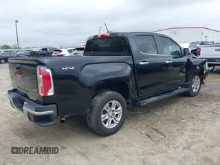 2019 GMC Canyon 4WD SLE with VIN 1GTG6CEN4K1329011, listed as a IAAI auction lot 41920100 with 82,343 mi miles. Bid and sale history available at carsss.com. Image 4.
