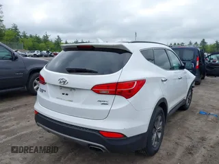 2014 Hyundai Santa Fe z VIN 5XYZUDLB9EG227009, wystawiony jako IAAI lot #42272191 z przebiegiem 97 474 mil mil oraz . Historia ofert i sprzedaży dostępna na DreamBid. Obrazek 4.