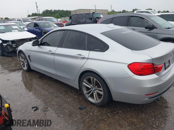 2015 BMW 4 Series 428i with VIN WBA4A9C50FD416459, listed as a IAAI auction lot 42471985 with 160,089 mi miles and . Bid and sale history available at DreamBid. Image 3.
