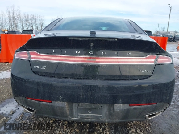 2016 Lincoln MKZ z VIN 3LN6L2JK8GR602793, wystawiony jako IAAI lot #41744058 z przebiegiem 105 234 mil mil oraz . Historia ofert i sprzedaży dostępna na DreamBid. Obrazek 16.