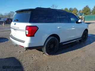 2023 Ford Expedition XLT with VIN 1FMJU1J80PEA44656, listed as a IAAI auction lot 41643672 with 31,890 mi miles. Bid and sale history available at carsss.com. Image 4.