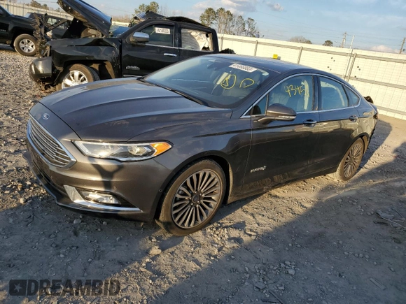 2018 Ford Fusion Hybrid Titanium with VIN 3FA6P0RUXJR210415, listed as a Copart auction lot 41466883 with 43,451 mi miles. Bid and sale history available at carsss.com. Image 1.