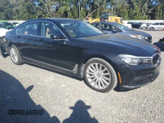 2018 BMW 7 Series 740i with VIN WBA7E2C53JG743115, listed as a Copart auction lot 73362103 with 57,789 mi miles. Bid and sale history available at carsss.com. Image 4.