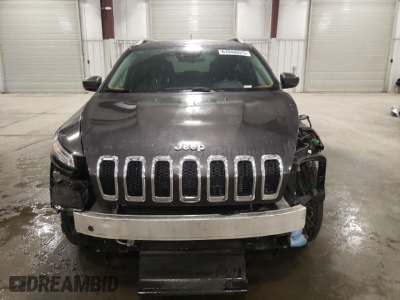 2014 Jeep Cherokee Limited with VIN 1C4PJLDS9EW241374, listed as a Copart auction lot 61048025 with 77,697 mi miles and Salvage title. Bid and sale history available at DreamBid. Image 5.