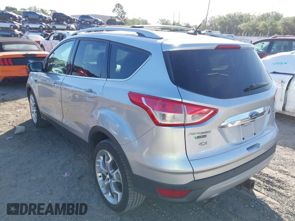 2016 Ford Escape Titanium with VIN 1FMCU0J94GUB11776, listed as a IAAI auction lot 41945655 with 119,949 mi miles. Bid and sale history available at carsss.com. Image 3.