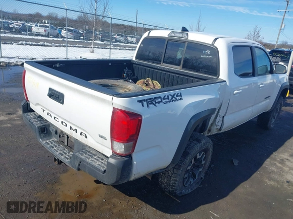 2016 Toyota Tacoma SR with VIN 5TFCZ5AN1GX017336, listed as a IAAI auction lot 41542111 with 127,162 mi miles. Bid and sale history available at carsss.com. Image 4.