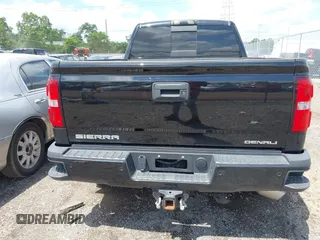 2015 GMC Sierra 2500HD Denali with VIN 1GT120E82FF574358, listed as a IAAI auction lot 42377676 with 86,097 mi miles and . Bid and sale history available at DreamBid. Image 16.