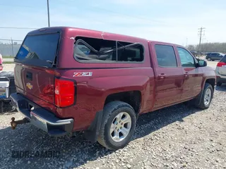 2015 Chevrolet Silverado 1500 LT with VIN 3GCUKREC0FG428366, listed as a IAAI auction lot 42210969 with 118,352 mi miles and . Bid and sale history available at DreamBid. Image 4.