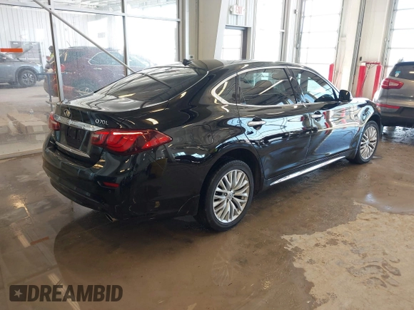2015 Infiniti Q70 with VIN JN1BY1PR2FM830317, listed as a IAAI auction lot 41619546 with 85,964 mi miles and . Bid and sale history available at DreamBid. Image 4.