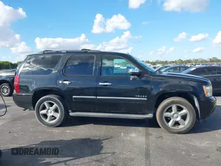 2012 Chevrolet Tahoe LTZ with VIN 1GNSKCE04CR218348, listed as a IAAI auction lot 41541342 with 96,365 mi miles and . Bid and sale history available at DreamBid. Image 13.