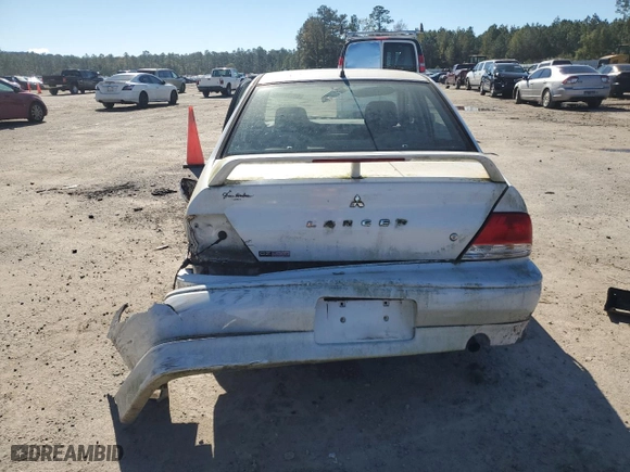2002 Mitsubishi Lancer OZ-Rally with VIN JA3AJ86E32U003276, listed as a Copart auction lot 80536704 with 227,684 mi miles and Salvage Title. Bid and sale history available at carsss.com. Image 6.