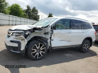 2021 Honda Pilot Touring 8-Passenger z VIN 5FNYF6H9XMB087615, wystawiony jako Copart lot #56853985 z przebiegiem 47 941 mil mil oraz Szkoda całkowita • Salvage title. Historia ofert i sprzedaży dostępna na DreamBid. Obrazek 1.