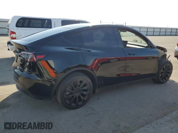 2023 Tesla Model Y Long Range with VIN 7SAYGDEE5PF834645, listed as a Copart auction lot 48596925 with 26,896 mi miles and Salvage Title. Bid and sale history available at DreamBid. Image 3.