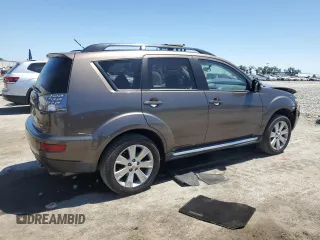2010 Mitsubishi Outlander SE z VIN JA4AS3AW3AZ004523, wystawiony jako Copart lot #52864695 z przebiegiem 133 500 mil mil oraz Szkoda całkowita • Salvage title. Historia ofert i sprzedaży dostępna na DreamBid. Obrazek 3.