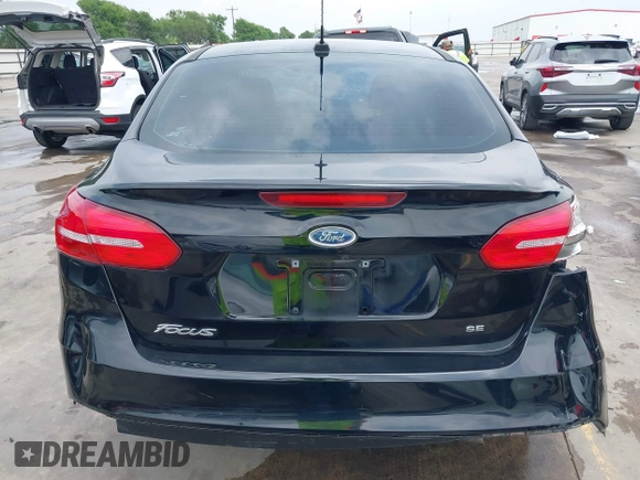 2018 Ford Focus SE with VIN 1FADP3F22JL311975, listed as a IAAI auction lot 41934856 with 68,974 mi miles. Bid and sale history available at carsss.com. Image 17.
