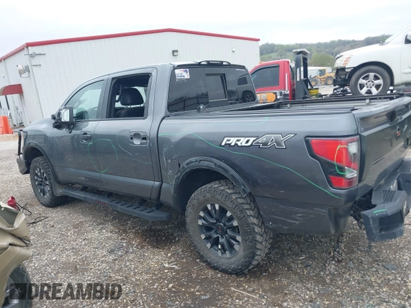 2021 Nissan Titan Pro-4X with VIN 1N6AA1ED3MN531332, listed as a IAAI auction lot 41918065 with 125,323 mi miles and . Bid and sale history available at DreamBid. Image 14.