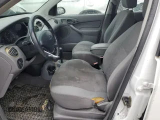 2004 Ford Focus with VIN 3FAFP37Z94R101447, listed as a Copart auction lot 74570054 with 162,166 mi miles and Salvage title. Bid and sale history available at DreamBid. Image 7.