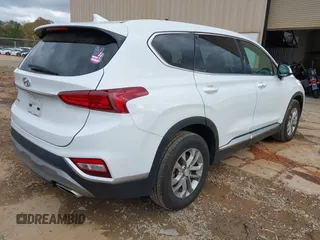 2020 Hyundai Santa Fe SEL w/SULEV with VIN 5NMS33AD9LH299253, listed as a IAAI auction lot 40772329 with 59,710 mi miles. Bid and sale history available at carsss.com. Image 4.