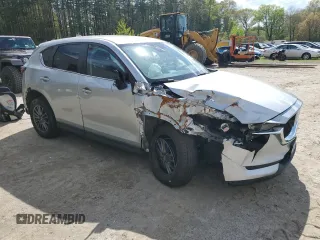 2021 Mazda CX-5 Touring z VIN JM3KFBCM1M0343804, wystawiony jako Copart lot #56194795 z przebiegiem 100 039 mil mil oraz Tytuł czysty. Historia ofert i sprzedaży dostępna na DreamBid. Obrazek 4.