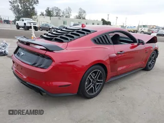 2020 Ford Mustang EcoBoost with VIN 1FA6P8TH4L5189982, listed as a IAAI auction lot 42065871 with 67,942 mi miles. Bid and sale history available at carsss.com. Image 4.