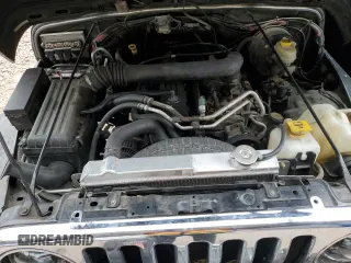 2006 Jeep Wrangler Unlimited LWB with VIN 1J4FA44S96P765356, listed as a Copart auction lot 45302355 with 109,932 mi miles and Salvage Title. Bid and sale history available at carsss.com. Image 11.